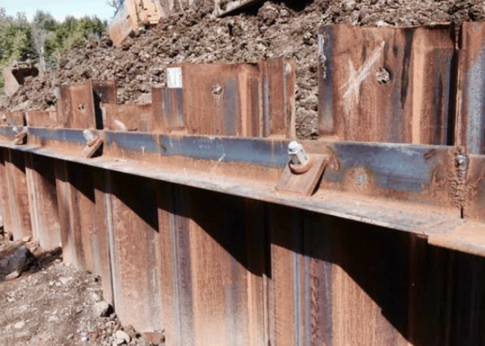 Stabilization of sewer lines and retaining wall by MFT